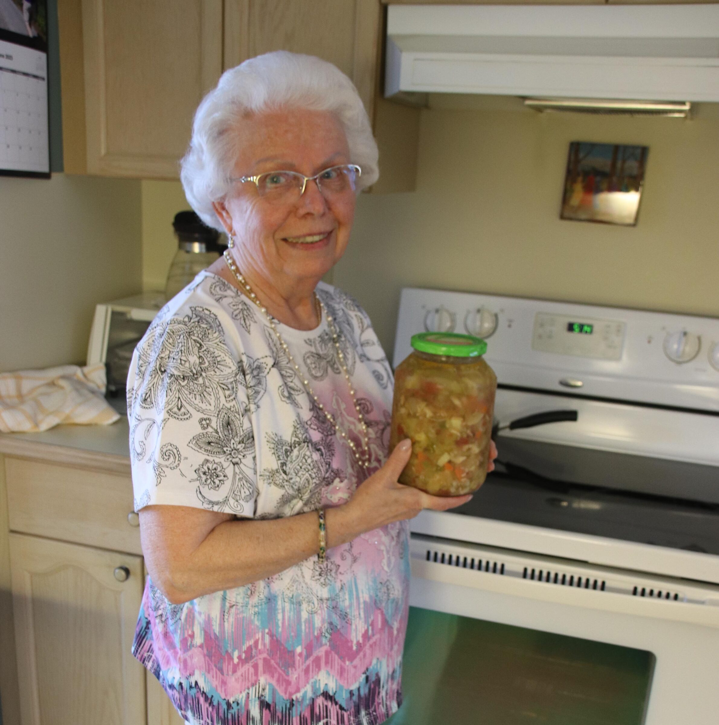 For Web Susan Wiebe Donor Holding Jar Of Borscht